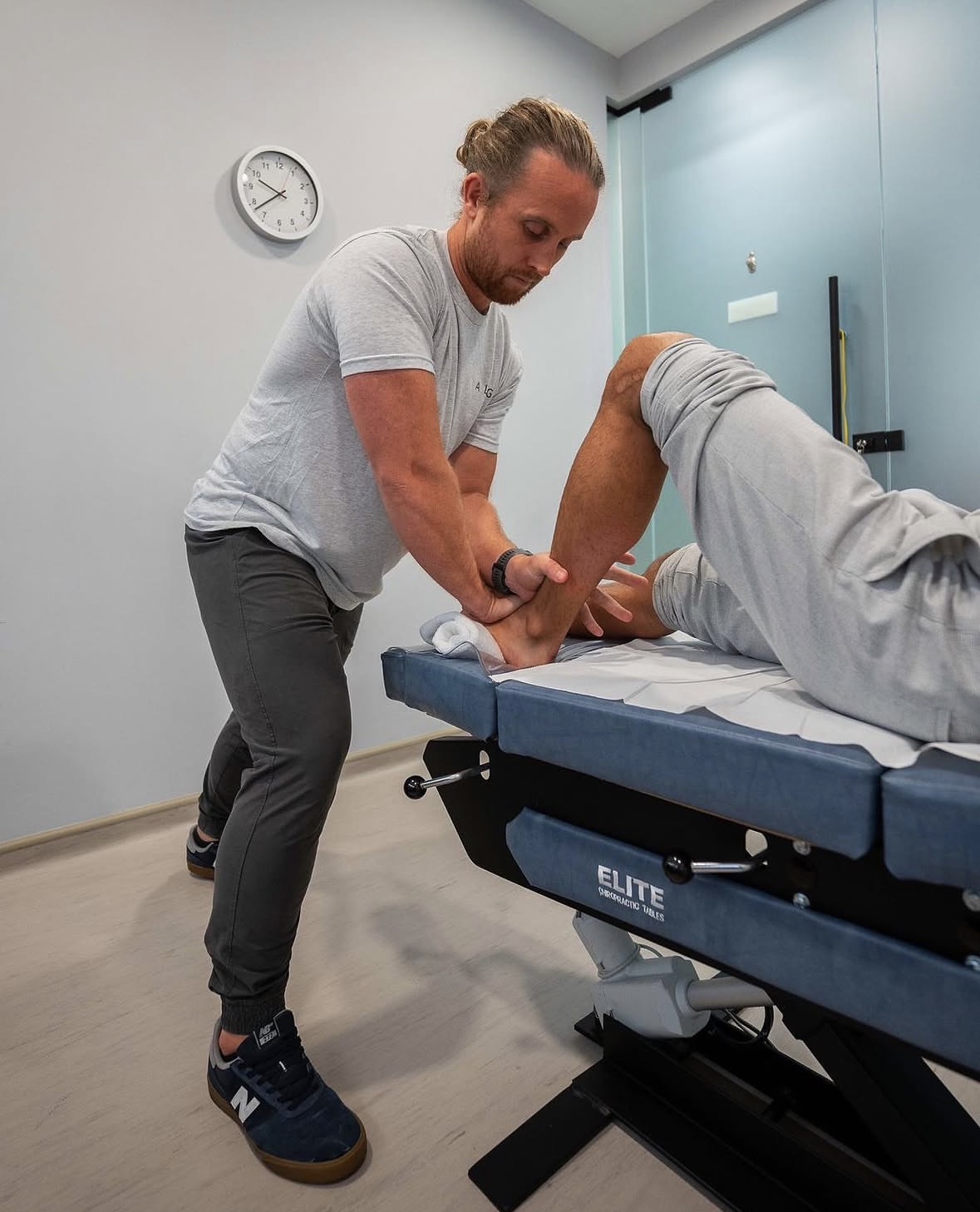 Siôn Jones providing lower limb treatment